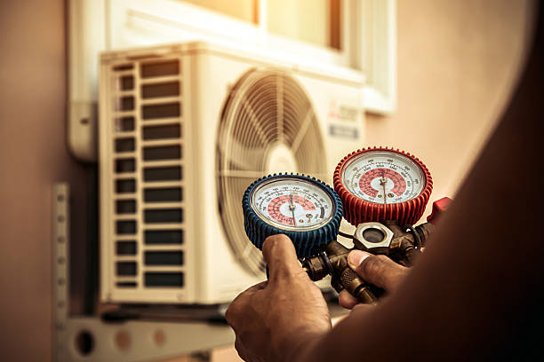 Professional Air Conditioning Service technician working in Pikeville, NC